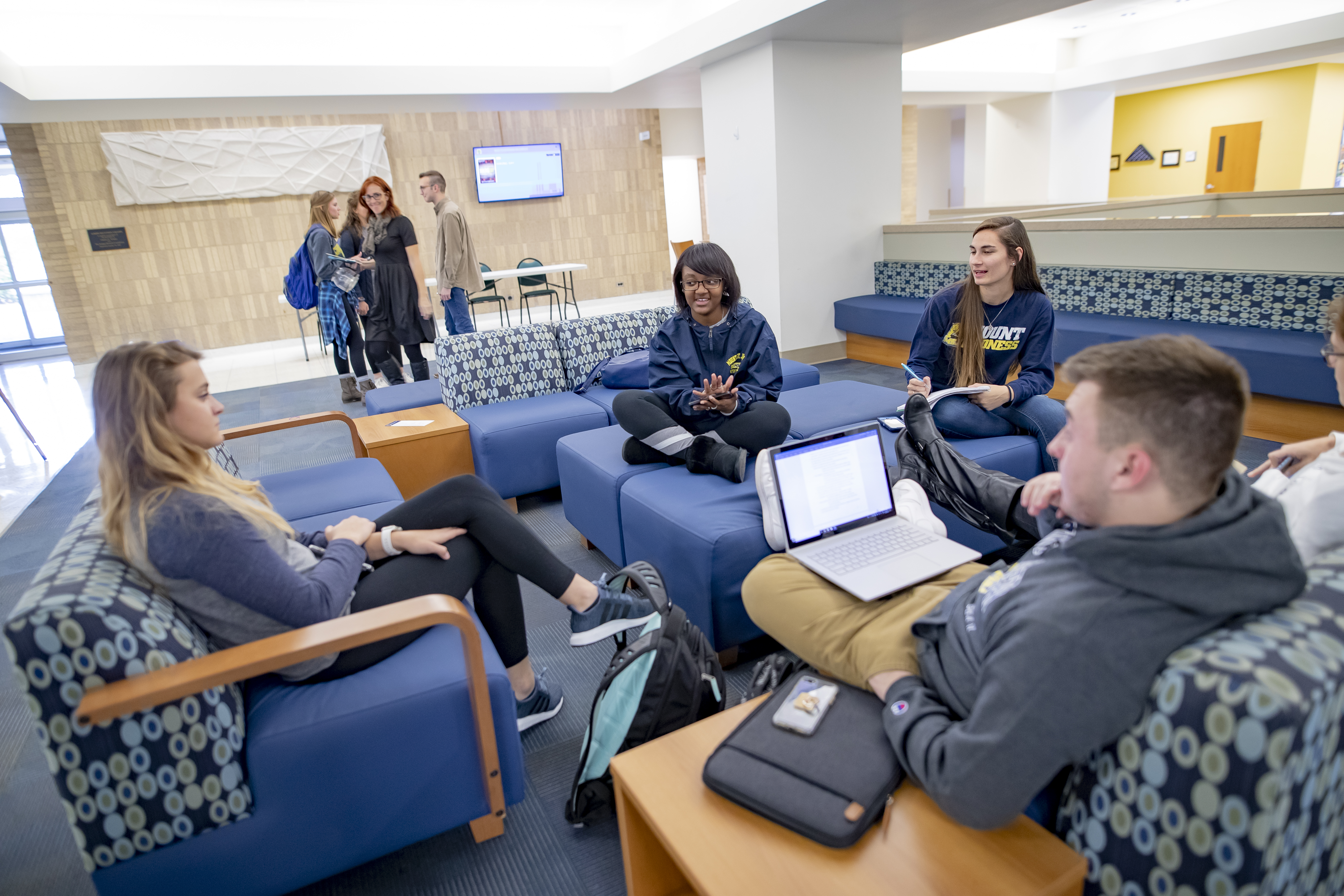 group of prospective students sitting in lobby