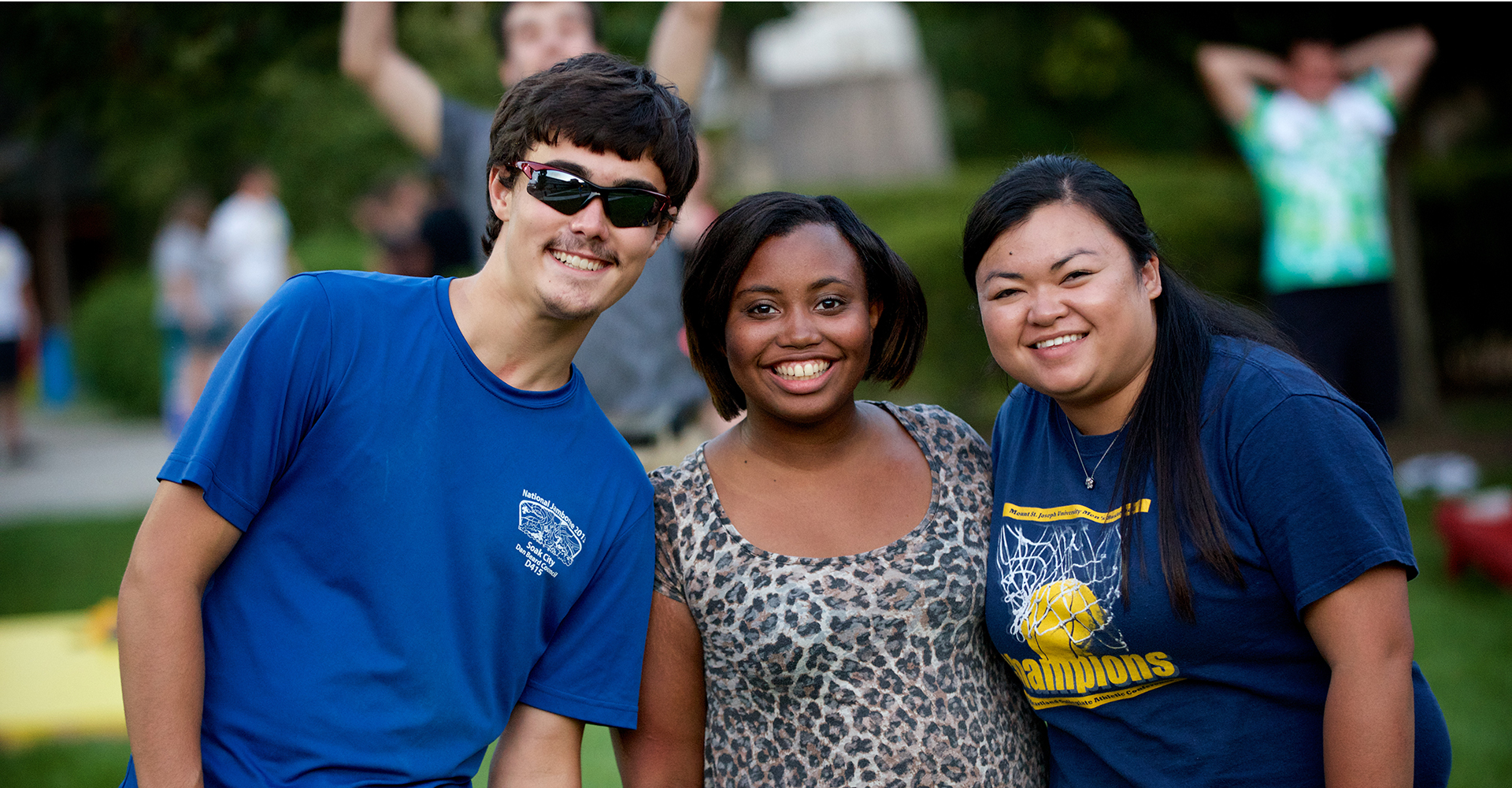 diverse students smiling in Mount St. Joseph University quad