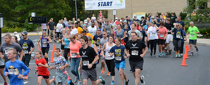 students running a marathon