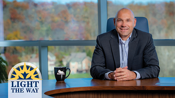 bank cfo sitting at desk