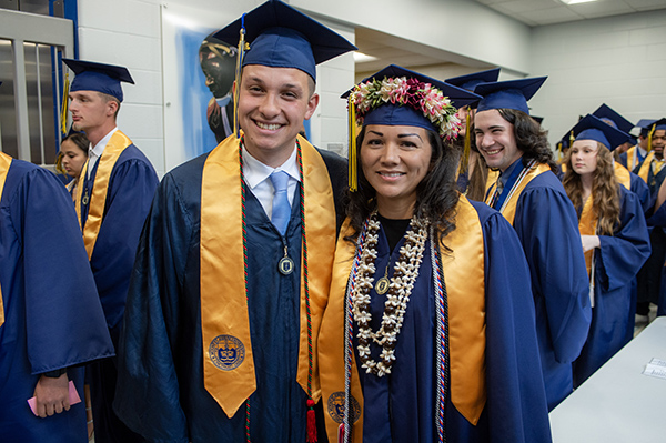 graduates smiling