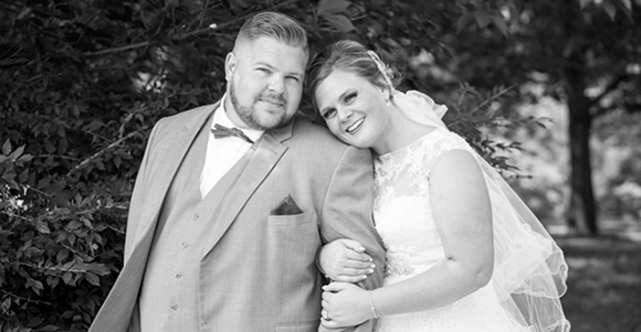 austin and katie cagle on wedding day smiling