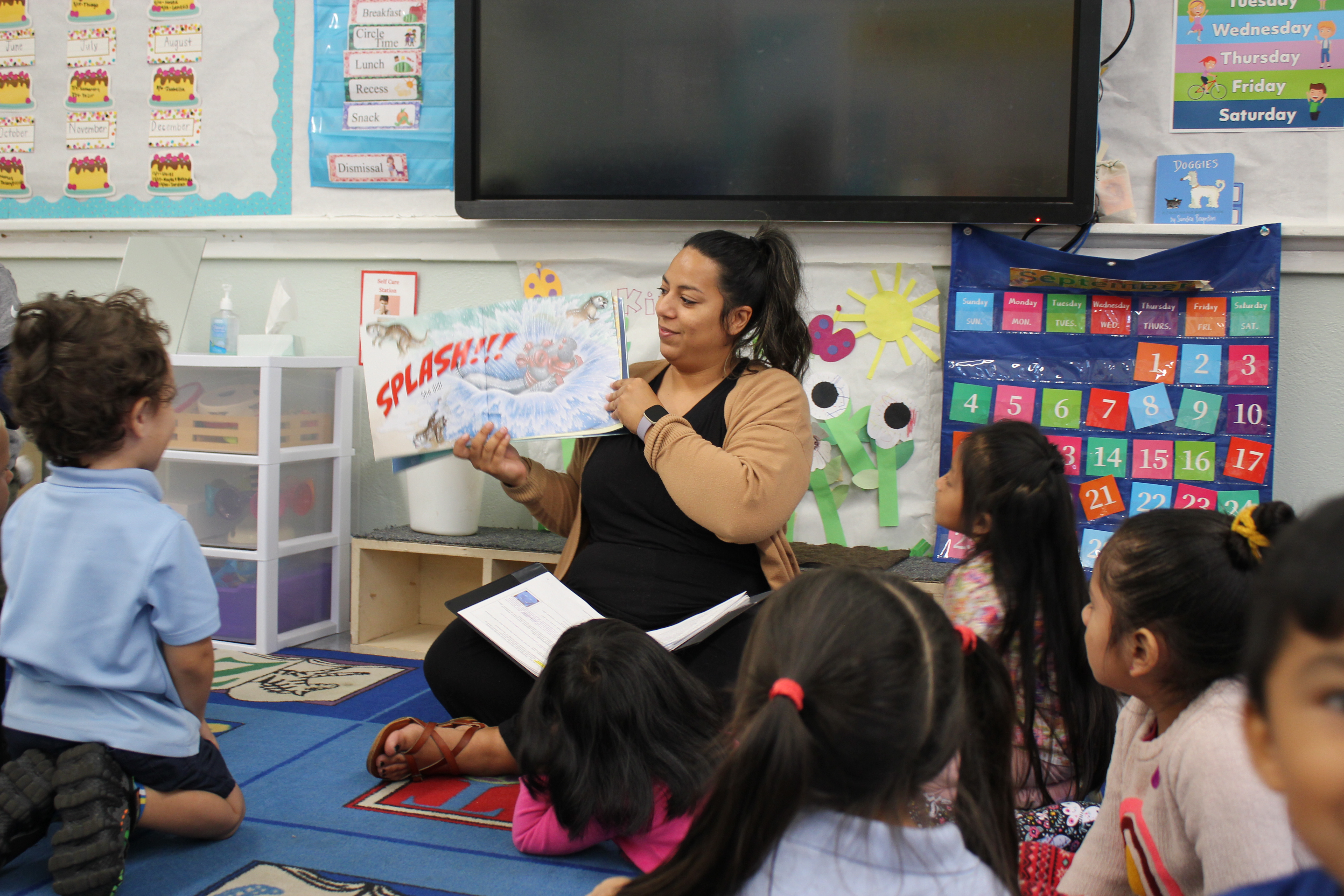 educator reading to children