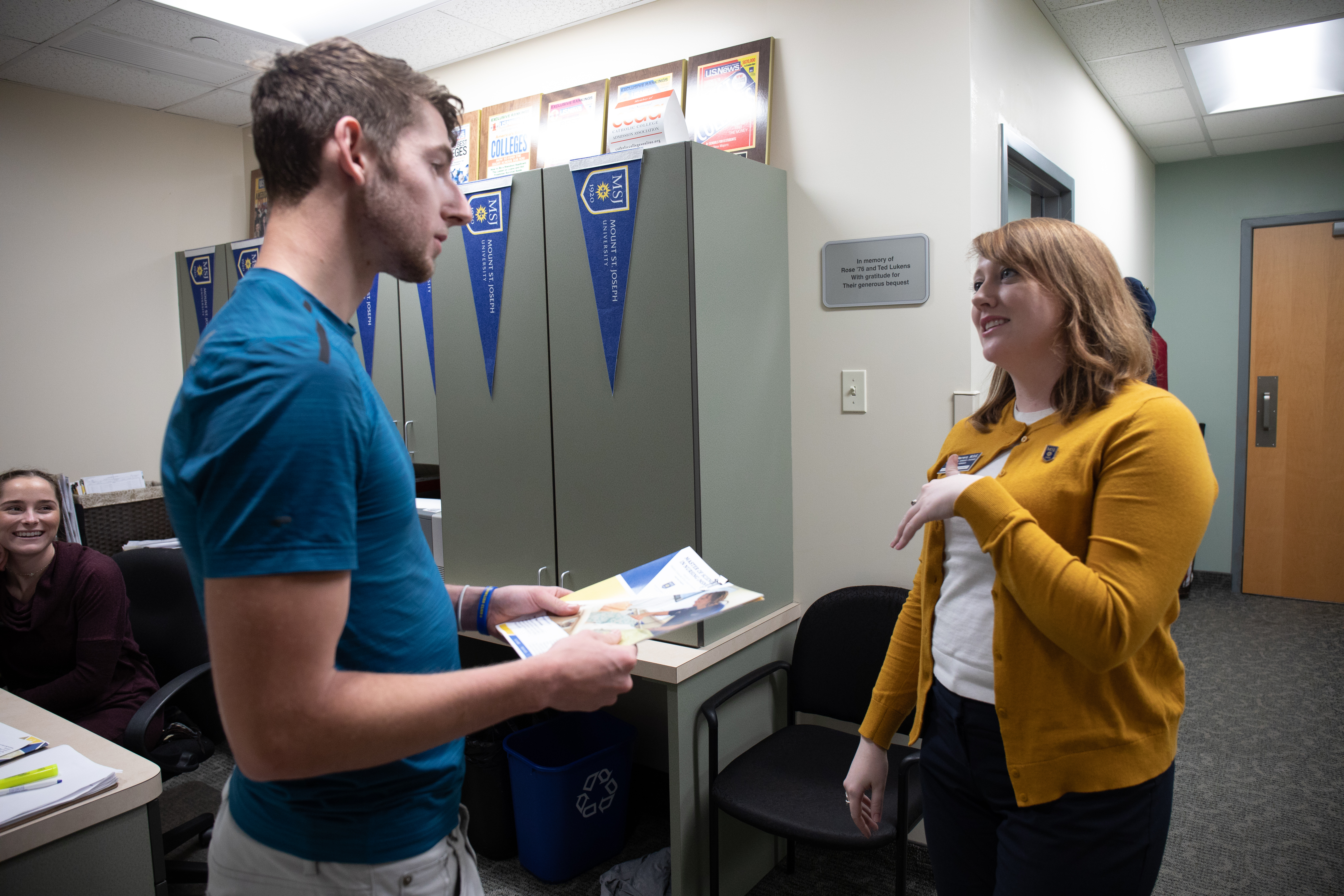 staff member advising student