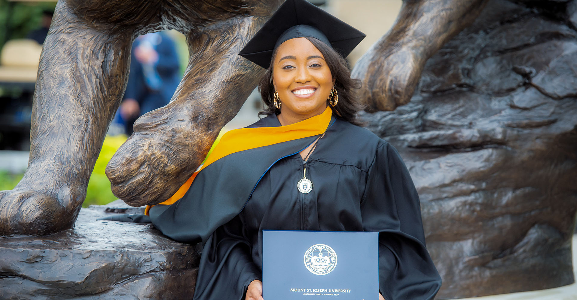 graduates by catamount statue
