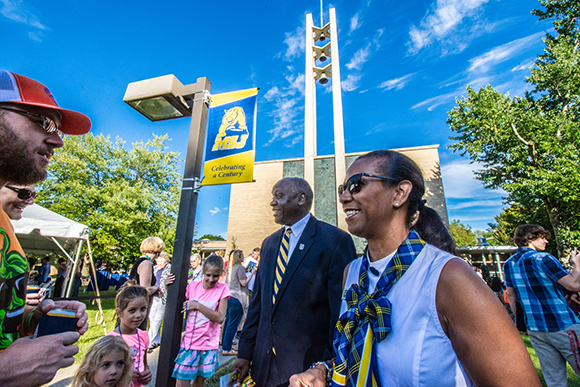 president h james and carole williams smiling