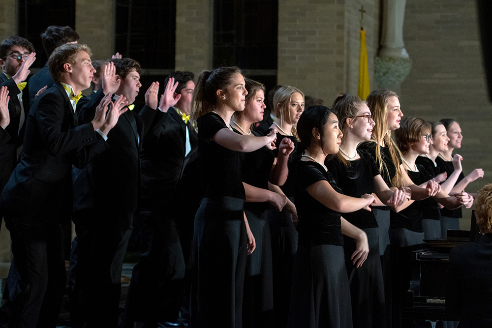 MSJ University Singers in Mater Dei Chapel for Christmas Choir concert.