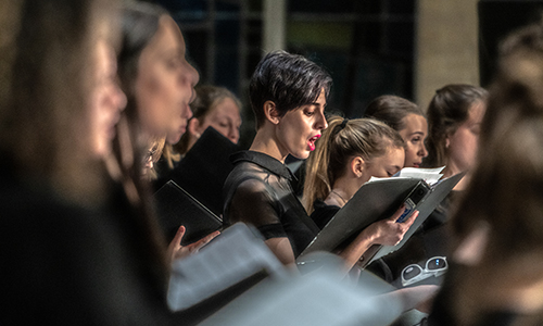 MSJ female University Singers performing in concert.