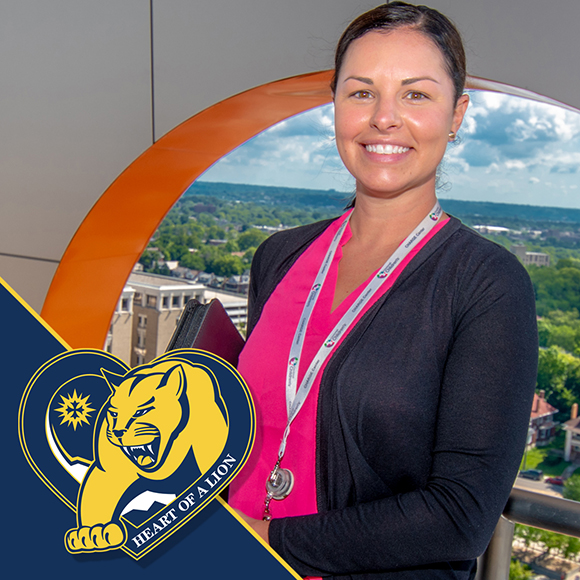 business woman standing in front of Children's Hospital