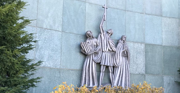 artwork of saints on theatre entrance.