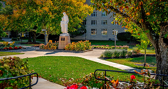 st. joseph statue in quad during fall