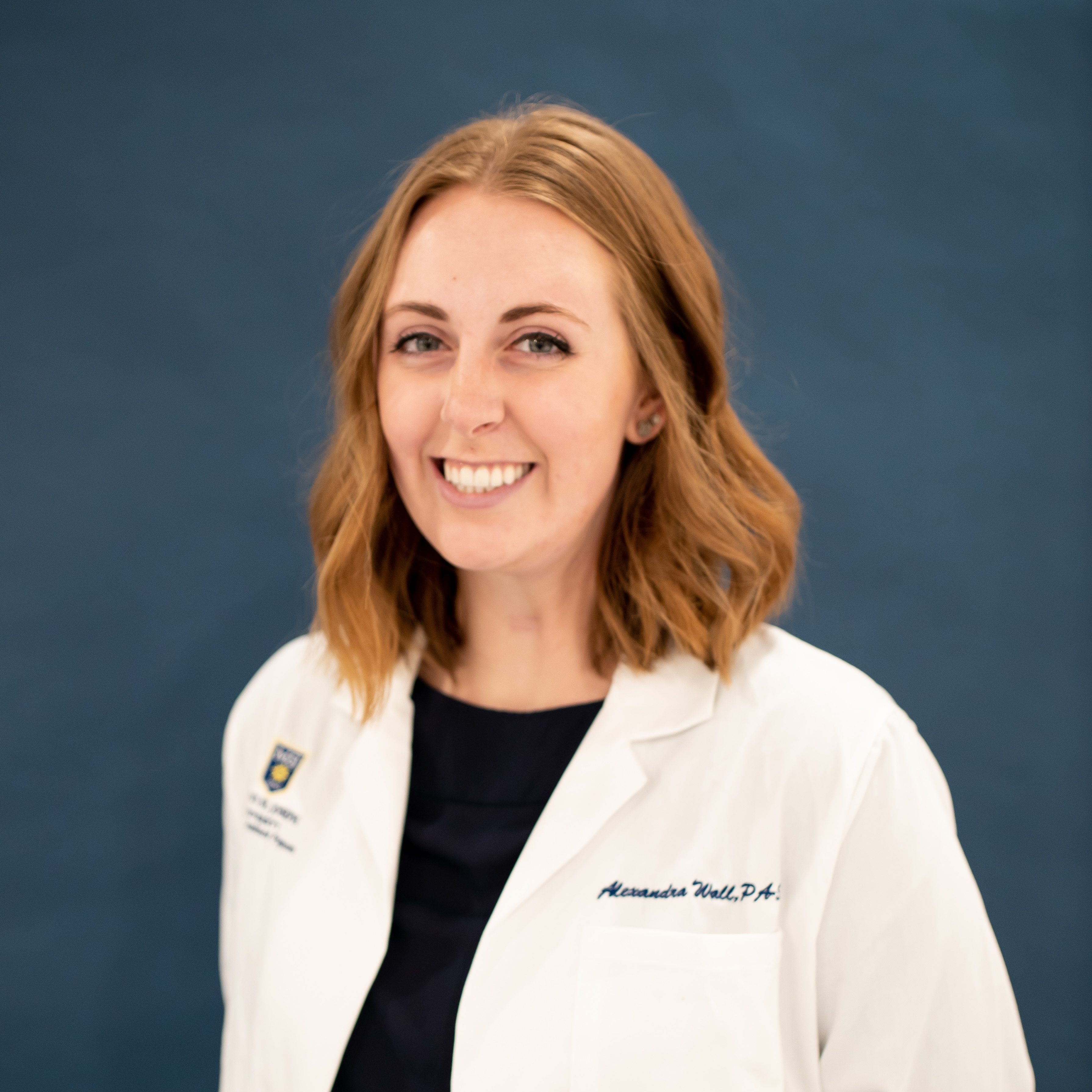 profile photo of alexandra wall in PA white coat.