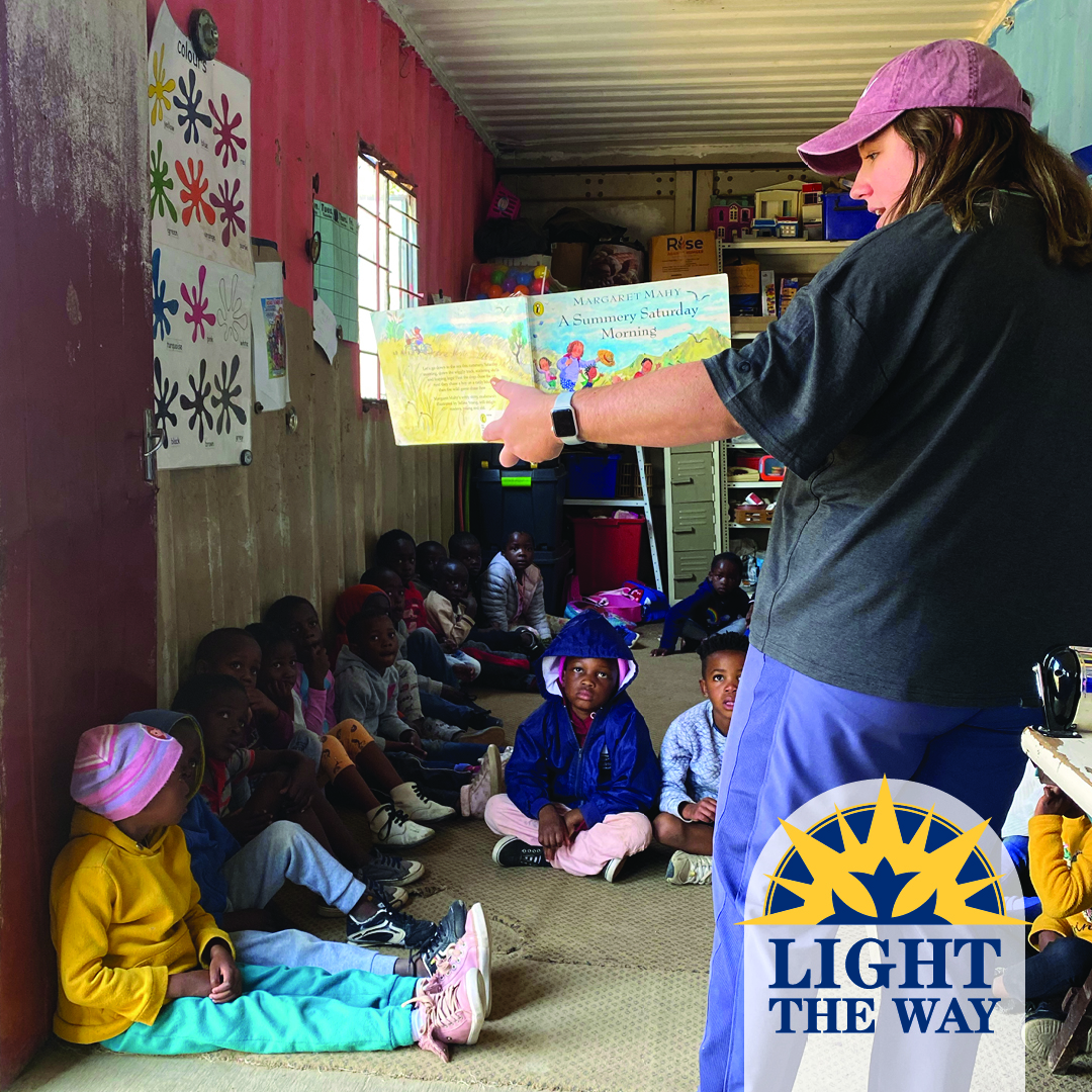 lexie cash in preschool reading to children in south africa