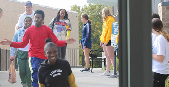 Mount St. Joseph University special olympians walking in the race