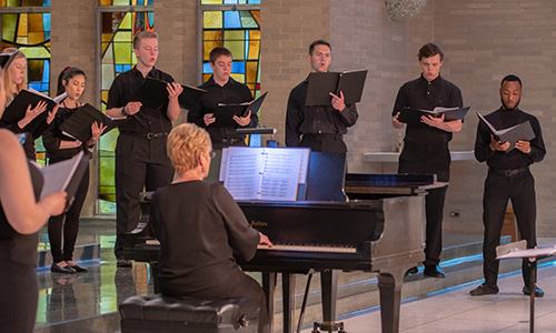 MSJ University Singers performing in Mater Dei Chapel.