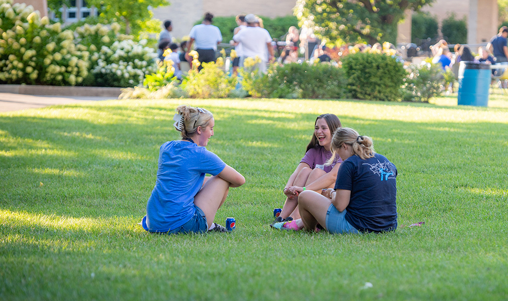 students laughing in quad